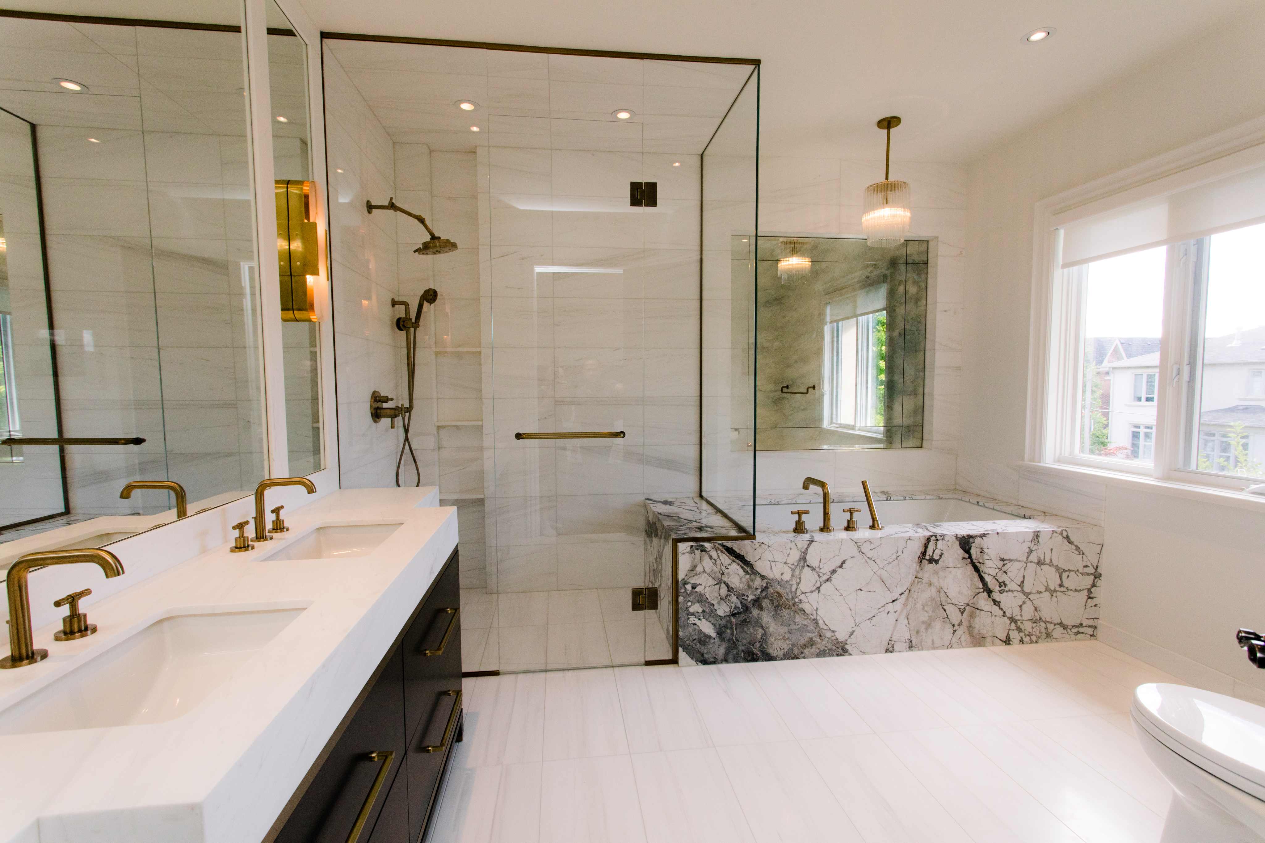 Master bathroom remodel in Maryland with walk-in tile shower and double vanity by Building Success LLC